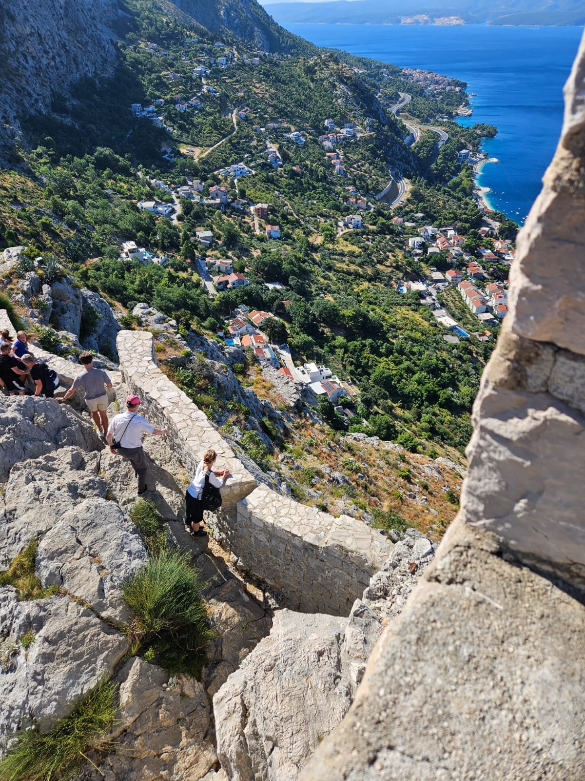 Walkers on the Omiška Dinara ridge above Omiš, Croatia