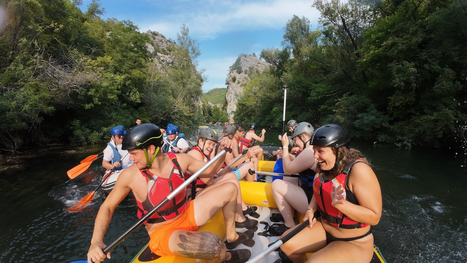 Calm drifting section of the 10 km Cetina rafting route through the canyon